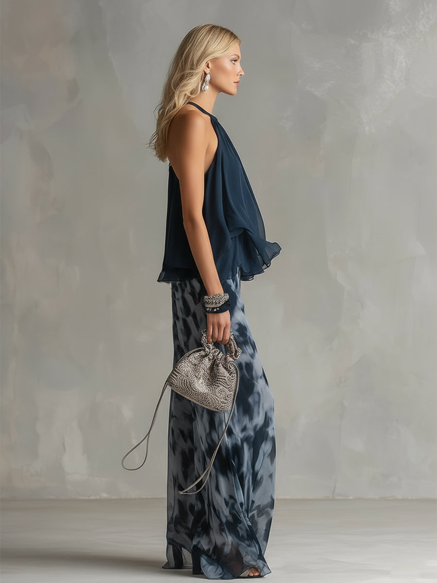 Celestina | Elegante conjunto de gasa con top halter azul marino urbano y pantalones anchos estampados.
