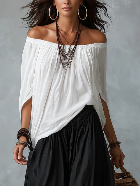 Marisa | Conjunto blanco: top de hombros descubiertos y pantalón globo