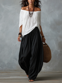 Marisa | Conjunto blanco: top de hombros descubiertos y pantalón globo