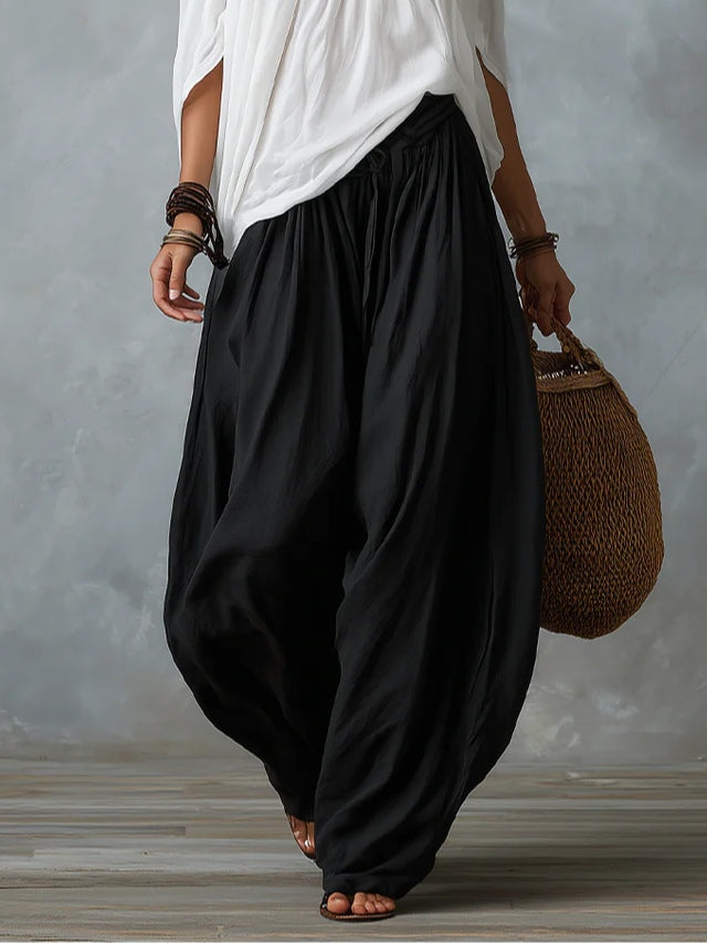 Marisa | Conjunto blanco: top de hombros descubiertos y pantalón globo